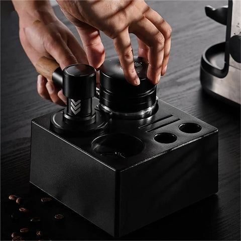 Straight Fire Dual Bearing Espresso Distributor And Tamper Combo Fits 51 54 58mm Filter Baskets, black handheld coffee tool in use.