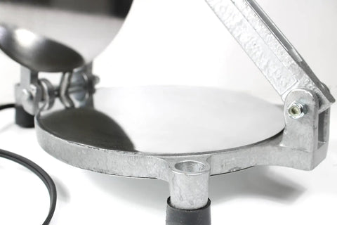 Get This Electric Tortilla Press Maker For Quick Chapati And Roti Prep At Home close-up of 8 inch metal pressing plate and insulated handle.