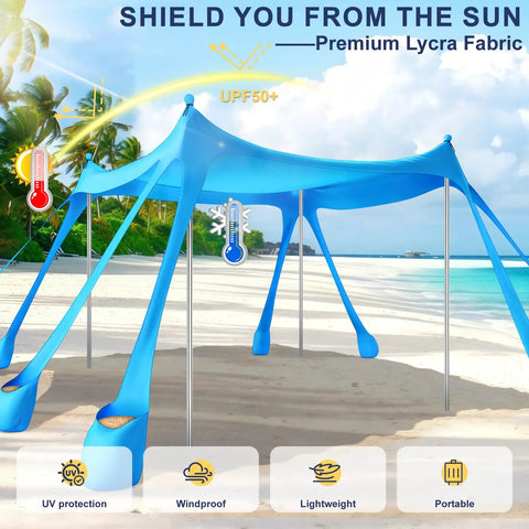 Pop Up Beach Canopy Sun Shelter with UPF Fifty and Ten by Ten Foot Coverage on a sunny beach with windproof frame and sandbags