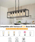 Slick Black 6 Light Linear Chandelier with E26 sockets, modern farmhouse design above kitchen island, matte steel frame.