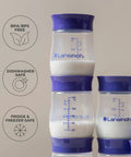 Soft Anti Colic Nipples For Everyday Bottle Feedings Paired With 5 Oz Breastmilk Storage Bottles In A Four Pack stacked bottles.