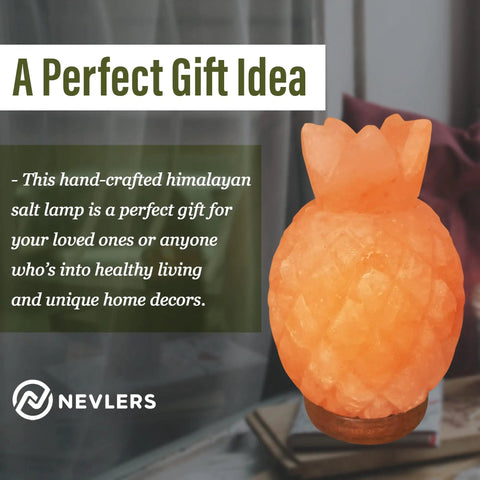 Orange Himalayan salt lamp on wood base in a pineapple shape, casting warm glow. Text: 'A Perfect Gift Idea' promoting healthy living.