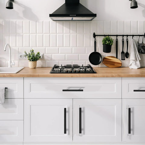 Modern kitchen with white cabinets featuring Twenty Pack Matte Black Cabinet Pulls With 96 Millimeter Hole Center For Easy Install And A 5.7 Inch Overall Length Stainless Steel Hardware For Kitchen Cabinets Bathroom Drawers And Closet Shelves.
