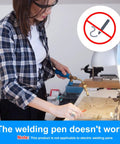 Person using traditional welding tools, note on non-compatibility with electric pens, related to Pro Grade 14 Inch Silver Plated Gold Plated Alloy Solder Wire For Jewelry Making And Electronics Low Temperature Hard Weld 0.88mm Diameter 35cm Length With 50 To 70 Percent Silver Content For Repairs.