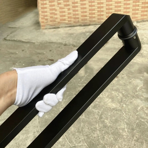 Heavy Duty Sliding Barn Door Handle Set With Double Side Pull for Front Entrance Doors, aluminum alloy detail being held