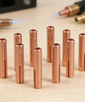 10pcs Brass TIG Welding Collet Electrode Holder For WP9 20 25 Torch With 3-32 And 1-8 In Gas Lens on wooden surface.