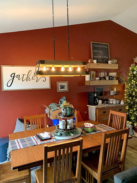 Rustic Modern Farmhouse Kitchen Island Light With Wood Panel Rectangular Frame 34 Inch Five Light Oil Rubbed Bronze Finish And Russet Oak Panels For Industrial Cozy Vibe in dining room setting above wooden table.