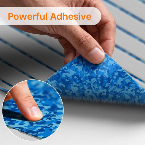 Close-up of hand peeling back Self Adhesive EVA Foam Soft Foam Decking 6mm Grippy Non Slip Marine Decking With Teak Look Finish