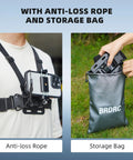 Person wearing Go To POV Phone Chest Mount And Head Mount Camera Rig, adjacent to a hand placing it in a storage bag outdoors.