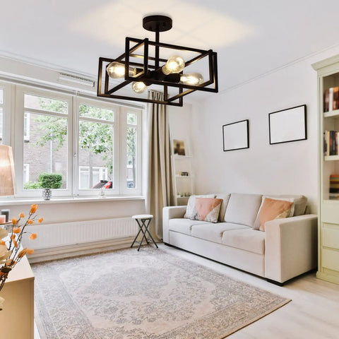 Slick Black 4 Light Ceiling Fixture, Industrial Farmhouse Flush Mount Chandelier in a bright living room with a beige sofa.
