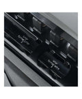 Close-up of Arc Desktop Paper Punch for Disc Bound Systems showing adjustable metal punch guides.