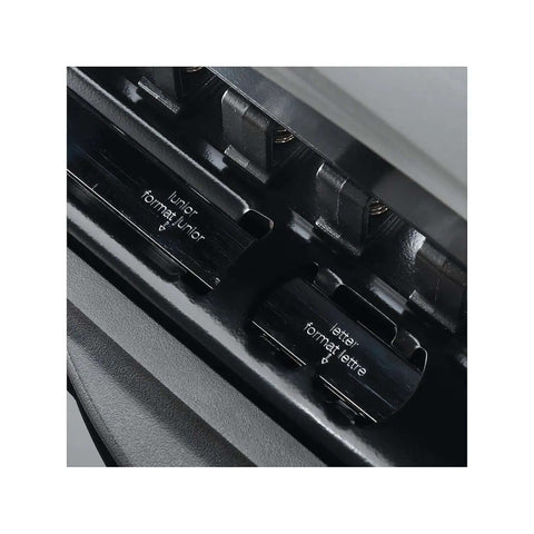 Close-up of Arc Desktop Paper Punch for Disc Bound Systems showing adjustable metal punch guides.