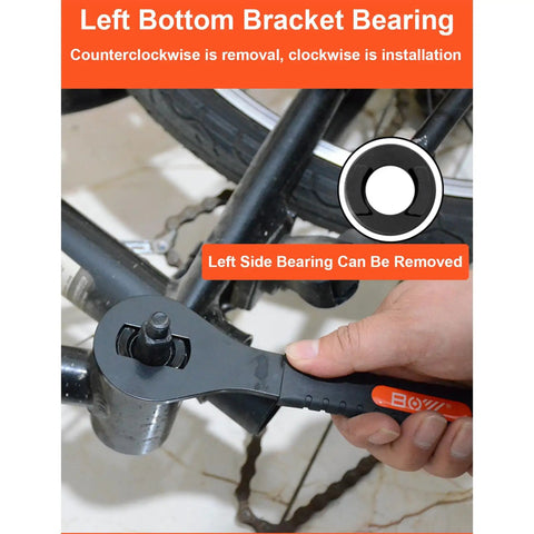 Hand using slotted 16mm bottom bracket adjustable cup wrench for bikes on bicycle part, removing old school BB cup.