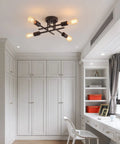 Four Light Black Semi Flush Mount Ceiling Light With Industrial Mid Century Vibe For Hallway Bathroom Bedroom Kitchen Dining Room Porch And Laundry UL Listed installed in a modern room