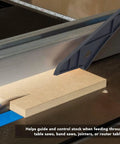 Ergonomic Push Stick For Table Saw, Band Saw, And Miter Saw For Safe, Precise Cuts With High Visibility shown guiding wood