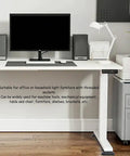 Office desk with a computer setup, supported by Two Pack Heavy Duty Threaded Leveling Feet M16 Furniture Glides 330 Lb Each Adjustable Height Anti Vibration Floor Protectors For Tables, Chairs, And Equipment.
