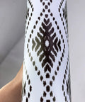 Close-up of rolled 15 Strips Peel And Stick Stair Riser Decals Boho Bohemian Self Adhesive Staircase Stickers in black pattern