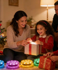 Family gathered by Christmas tree with Cool Submersible LED Pool Lights Kit With Remote, 13 LED Waterproof Color Changing Underwater Lights visible.