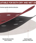 Close-up of 110 Pcs 6 Inch Round Hook And Loop Sanding Discs Set With 6 Hole Design, showing abrasive layers and texture.