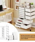 Grab-And-Go 15-Drawer Rolling Utility Cart With Lockable Wheels, metal frame, removable drawers, top shelf, in office setting.