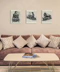 Three-piece steam train canvas art set of 3 11x14 inches framed wall prints for home office decor above a couch in a living room