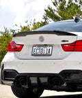 Cool Polka Dot Black And White License Plate Frame Two Pack Universal Fit Stainless Steel With Screws Included For Front And Rear Mounts Fits 6x12 Inch Plates on a car's rear.