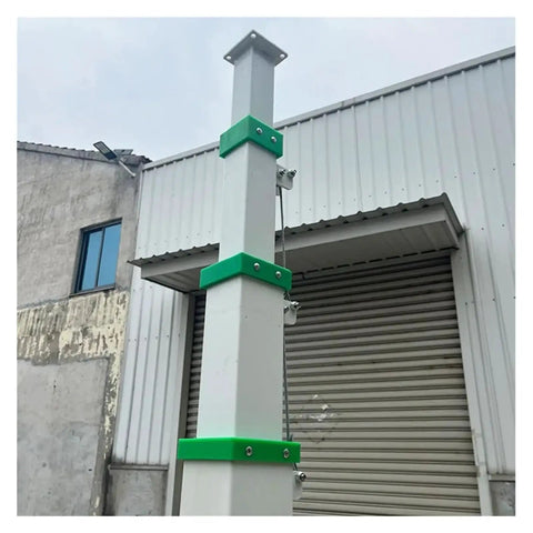 Heavy Duty Telescopic Lifting Mast With Smooth Hand Crank Winch Stretching Three To Nine Meters for job site lighting, showing green and silver pole.