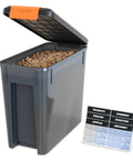 Level Up Your Smoke Game With This Heavy Duty Pellet Storage Bin Featuring A Rugged Locking Lid And Smart Stackable Design To Keep Wood Chips Bone Dry For Peak Grilling Days. Open bin with wood pellets and labeling stickers.
