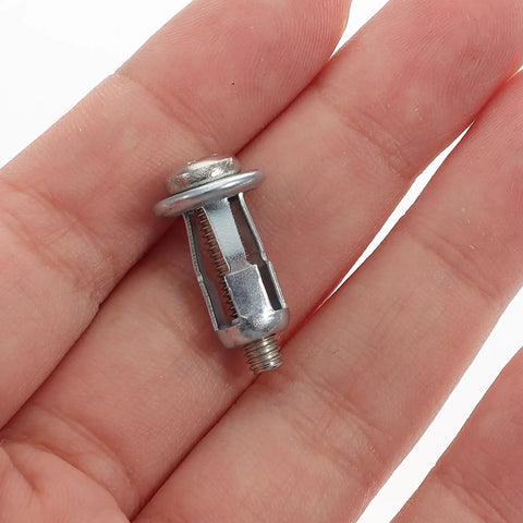 Beefy Hollow Wall Anchors M4 Kit For Drywall Fixings With Petal Expansion Nuts Zinc Plated Carbon Steel 50 Sets Universal Fit For Bathrooms Kitchens Outdoors Built To Last And Ready To Install, M4 anchor in hand