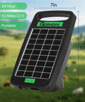 Go To Solar Fence Charger Energizer With 0.11J Output 5 Mile Range, portable solar-powered black fence charger on farm background.