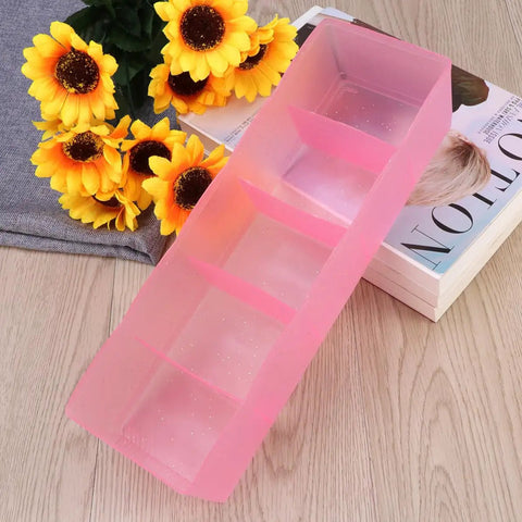 Solid Plastic Underwear Organizer Box With Five Grid Dividers For Closet Drawer Storage, pink container with five sections.