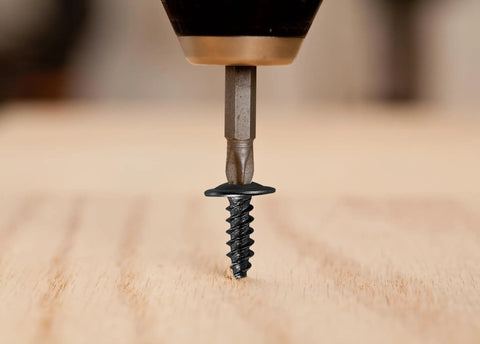 No Fuss Top Shelf Heavy Duty Workhorse Number 8 Black Truss Head Wood Screws and Drywall Plastic Anchors Assortment Kit in use.