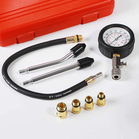 Flat-lay 8-piece engine compression tester kit with gauge, hoses and brass adapters in red case