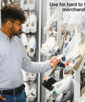 Man examining shoes displayed on a rack, using Heavy Duty Five Inch Clear Adjustable Loop Ties One Thousand Bulk Pack With Beaded Lock Pins.