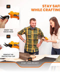 Slick Cordless Electric Fabric Scissors And Heavy Duty Cardboard Cutter With Two Swappable Blades in a DIY crafting setup.