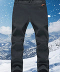 Men's Ski Waterproof Insulated Softshell Snow Pants With Fleece Lining And Zipper Pockets For Snowboarding And Outdoor Winter Activities Dark Gray 42W By 32L on snowy mountain background.