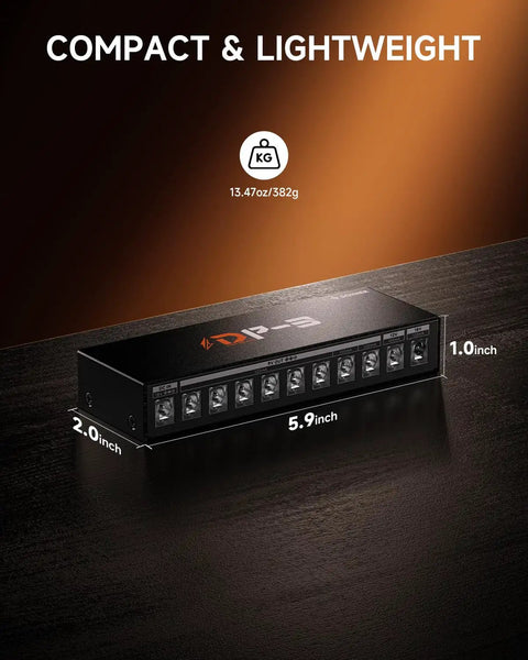 DP 3 Multi Output Guitar Pedal Power Supply With 10 Isolated DC Outputs laying on table with dimensions 5.9x2.0x1.0 inches