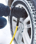 Person using Air Compressor Hose Quarter Inch By Fifty Feet Hybrid Hose With Fittings And Quick Coupler Kit on car tire