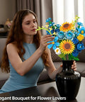 Van Gogh Starry Night And Sunflowers Inspired Bouquet Building Set Lego Compatible Flowers For Adults Women Vibrant Blue Yellow White Blooms To Brighten Desk Or Home Decor Perfect Gift For Christmas Mothers Day Or Just Because, woman arranging ABS bouquet in black vase