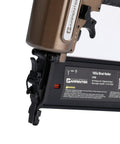 Heavy Duty Pneumatic Brad Nailer Delivers Top Notch Performance With No Hassle Quick Release And Dead Nuts Precision Depth Settings close-up of trigger and magazine.
