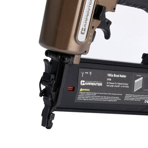Heavy Duty Pneumatic Brad Nailer Delivers Top Notch Performance With No Hassle Quick Release And Dead Nuts Precision Depth Settings close-up of trigger and magazine.