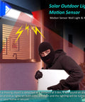 Outdoor Solar Motion Sensor Lights With Remote Control Four Modes Sensing Dim Alarm And Off illuminating intruder