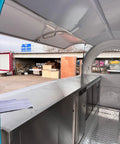 Interior view of Custom Designed Concession Food Truck Trailer With Turnkey Kitchen Layout And Heavy Duty Stainless Steel Body.