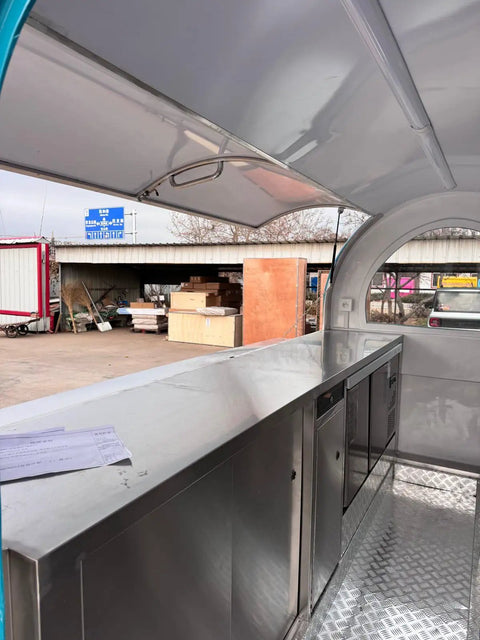 Interior view of Custom Designed Concession Food Truck Trailer With Turnkey Kitchen Layout And Heavy Duty Stainless Steel Body.