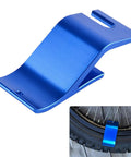 Close-up of a blue tire bead holder from 14.5 Inch Tire Spoons Kit For Motorcycles Dirt Bikes Lawn Mowers And More 7 Piece Tire Removal Tool Set