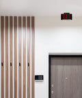 Ultra Bright Battery-Backed LED Exit Sign With Indoor Emergency Lighting And Chevron Arrow above door, black housing