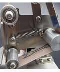 Close-up of Compact Mini Electric Belt Sander And Multifunctional Desktop Grinder raw material with high-speed motor components.