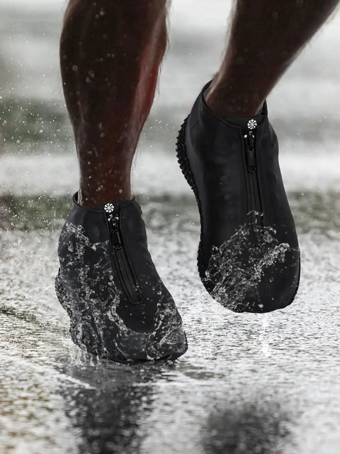 Waterproof Silicone Shoe Covers Overshoes With Non Slip Grip For Men Women Kids on feet splashing in water.