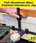 Cabinet Hardware Jig With Center Drill Guide For Drawer Handles And Pulls in use on white cabinet with drill and case shown