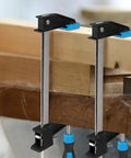 36 Inch Bar Clamps Set For Woodworking, 4 Pack, securing wooden pieces with adjustable quick release clamps in workshop scene.